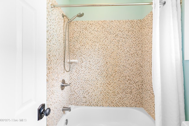 104 SE 32nd St, Oak Island, NC 28465 - bathroom featuring shower / tub combo with curtain