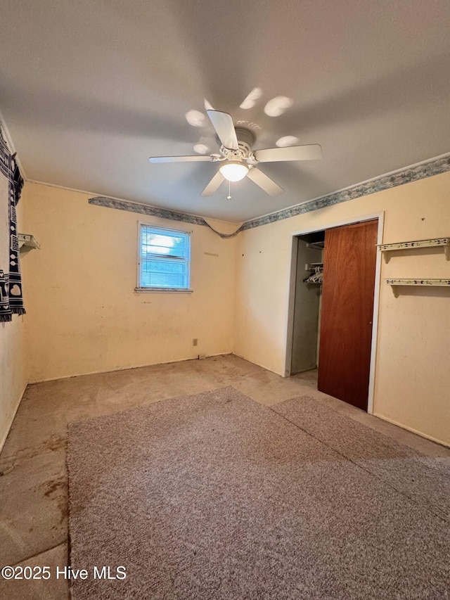 6748 Pitt St, Grifton, NC 28530 - unfurnished bedroom featuring carpet flooring, ceiling fan, and a closet