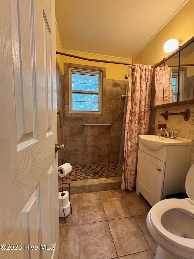 6748 Pitt St, Grifton, NC 28530 - full bath with tiled shower, toilet, and vanity