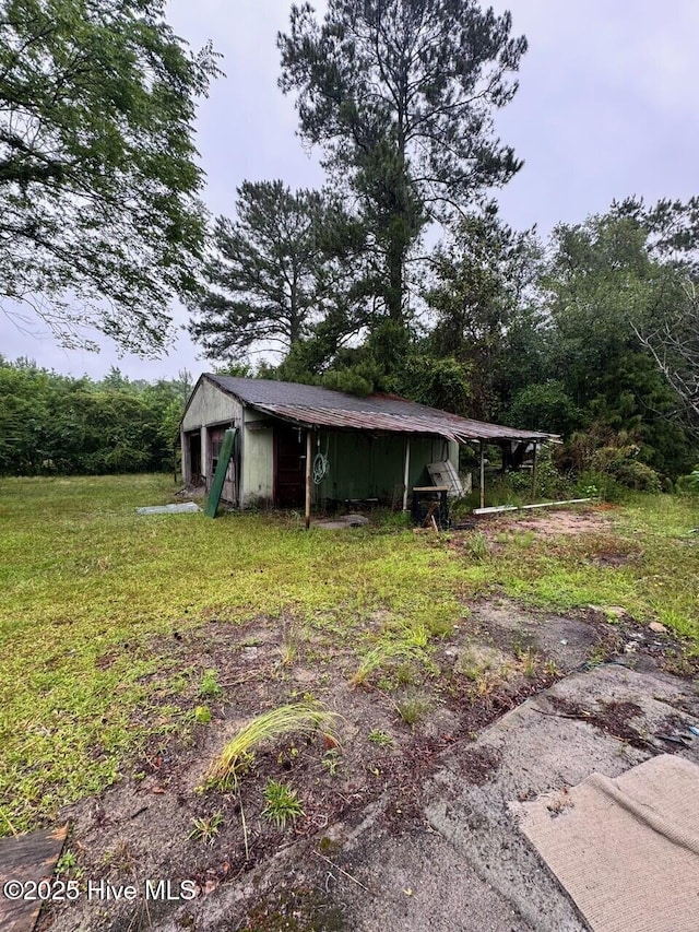 6748 Pitt St, Grifton, NC 28530 - view of yard featuring an outbuilding
