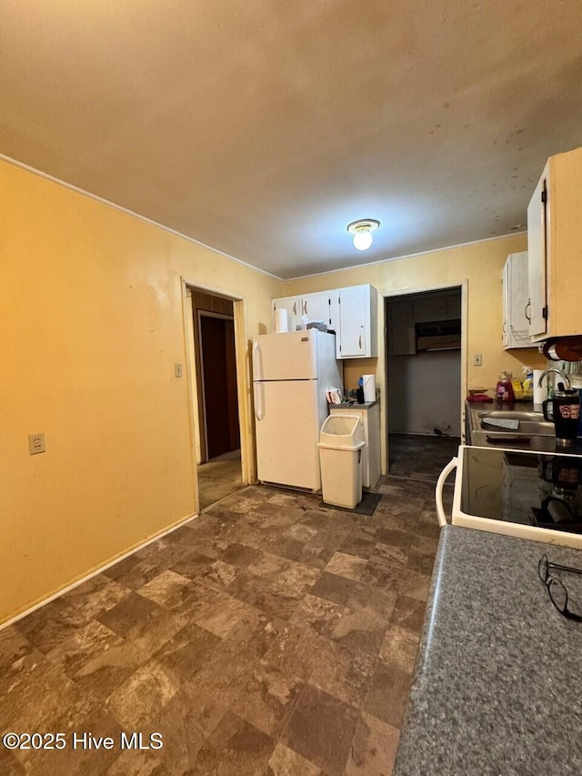 6748 Pitt St, Grifton, NC 28530 - kitchen featuring white appliances, white cabinetry, and a sink