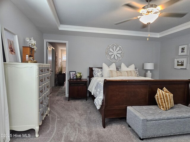 568 Transom Way, Sneads Ferry, NC 28460 - bedroom featuring crown molding, carpet flooring, a raised ceiling, and ceiling fan