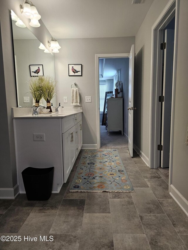 568 Transom Way, Sneads Ferry, NC 28460 - bathroom featuring vanity and baseboards