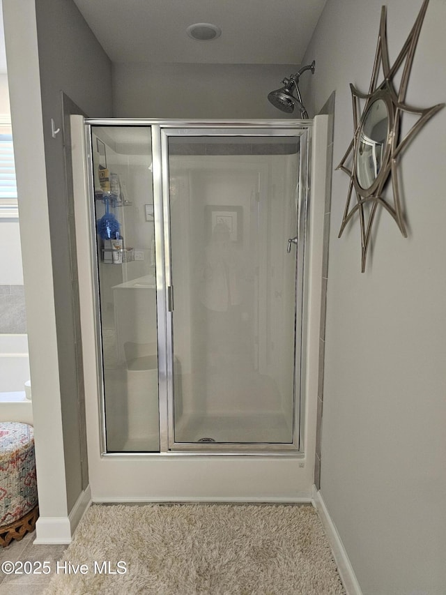 568 Transom Way, Sneads Ferry, NC 28460 - bathroom featuring a shower stall and baseboards