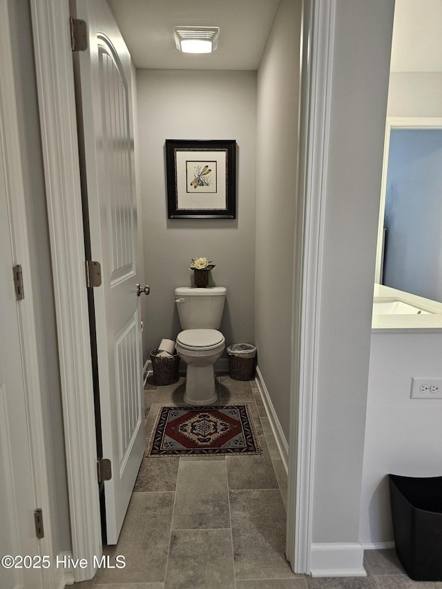 568 Transom Way, Sneads Ferry, NC 28460 - bathroom featuring toilet and baseboards