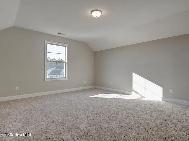 568 Transom Way, Sneads Ferry, NC 28460 - bonus room with lofted ceiling, baseboards, and carpet