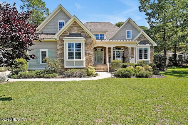 886 Hollybriar Dr SE, Bolivia, NC 28422 - craftsman house with a front lawn, a standing seam roof, covered porch, stone siding, and a shingled roof