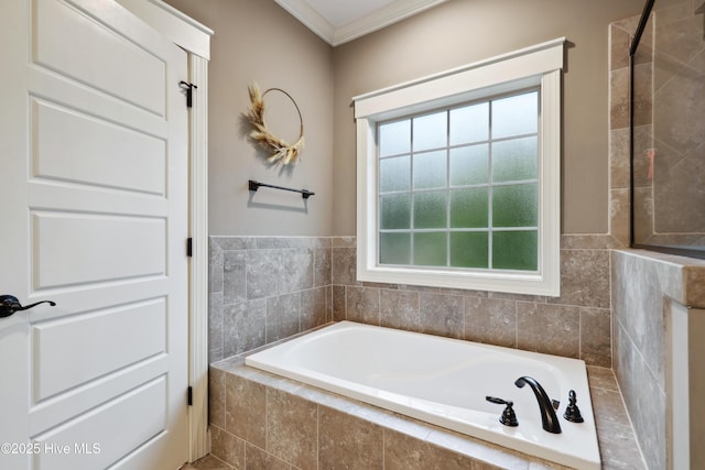 full bathroom featuring crown molding and a garden tub