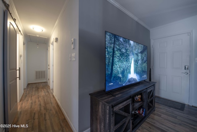 2518 Pilot-Riley Rd, Zebulon, NC 27597 - hallway with attic access, wood finished floors, crown molding, and baseboards
