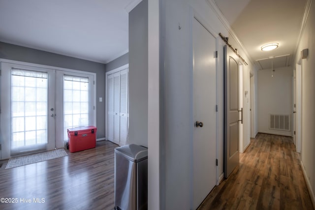 2518 Pilot-Riley Rd, Zebulon, NC 27597 - hall with attic access, french doors, wood finished floors, and crown molding