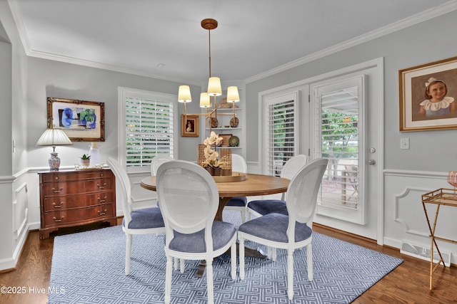 1218 Country Club Rd, Wilmington, NC 28403 - dining room with dark wood-style floors, ornamental molding, healthy amount of natural light, a wainscoted wall, and a decorative wall