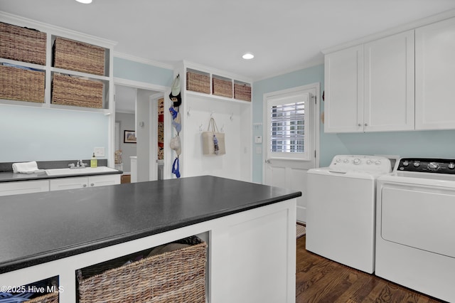 1218 Country Club Rd, Wilmington, NC 28403 - washroom with cabinet space, washing machine and dryer, dark wood-style flooring, crown molding, and recessed lighting