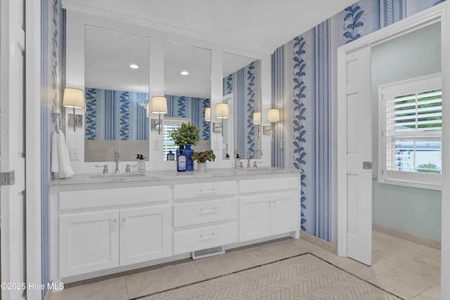 1218 Country Club Rd, Wilmington, NC 28403 - full bath with wallpapered walls, tile patterned flooring, double vanity, and baseboards