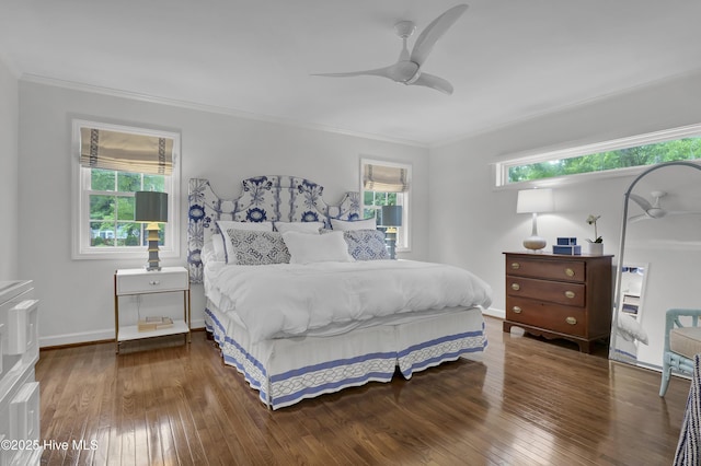 1218 Country Club Rd, Wilmington, NC 28403 - bedroom featuring wood-type flooring, multiple windows, crown molding, a ceiling fan, and baseboards