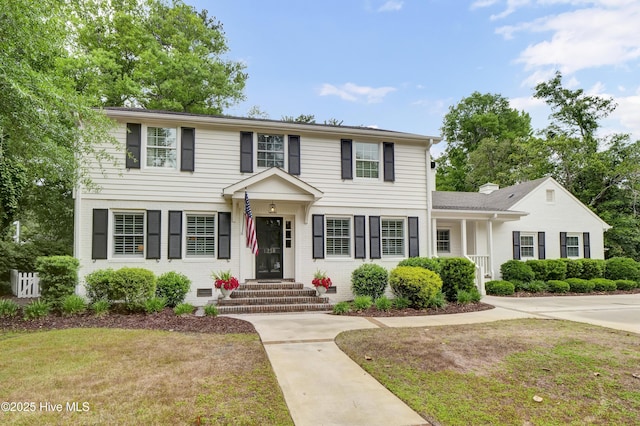 1218 Country Club Rd, Wilmington, NC 28403 - colonial-style house with a front yard