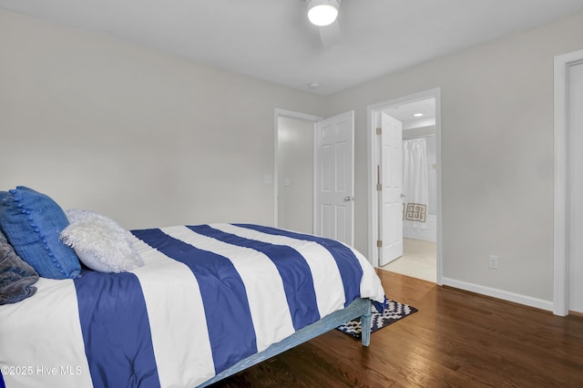 1218 Country Club Rd, Wilmington, NC 28403 - bedroom featuring wood finished floors, baseboards, and ensuite bathroom