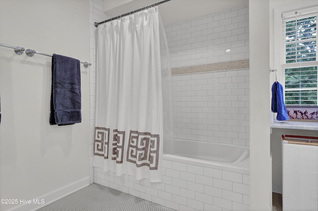 1218 Country Club Rd, Wilmington, NC 28403 - bathroom featuring tiled shower / bath combo, tile patterned floors, and plenty of natural light