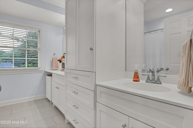 1218 Country Club Rd, Wilmington, NC 28403 - full bathroom with baseboards, vanity, tile patterned floors, and recessed lighting