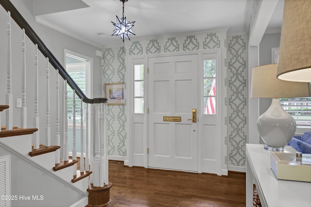 1218 Country Club Rd, Wilmington, NC 28403 - entrance foyer featuring wallpapered walls, dark wood-style floors, stairway, crown molding, and baseboards