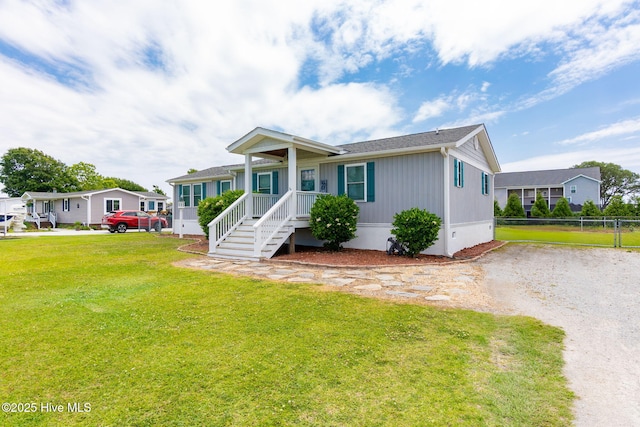 manufactured / mobile home featuring covered porch