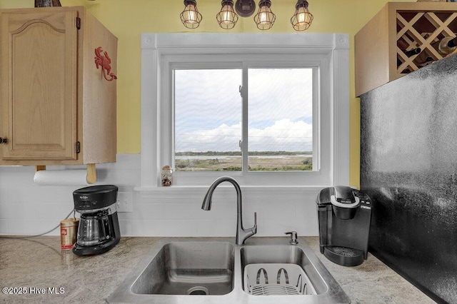 167 Topsail Rd, North Topsail Beach, NC 28460 - kitchen featuring light countertops and light brown cabinetry