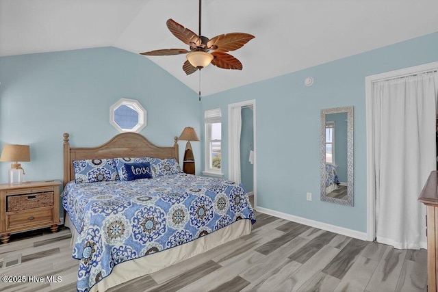 167 Topsail Rd, North Topsail Beach, NC 28460 - bedroom with multiple windows, lofted ceiling, wood finished floors, and a ceiling fan