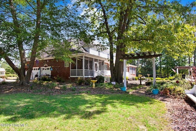 342 Shirley Plantation Dr, Snow Hill, NC 28580 - back of house featuring a sunroom and a lawn