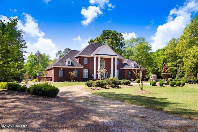 342 Shirley Plantation Dr, Snow Hill, NC 28580 - greek revival house with a front lawn and brick siding