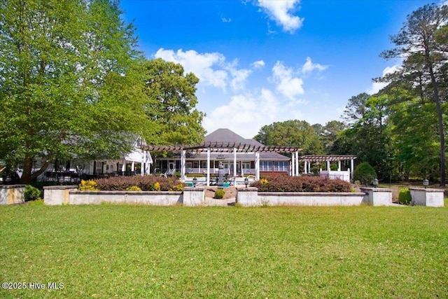 342 Shirley Plantation Dr, Snow Hill, NC 28580 - back of property featuring a pergola and a lawn