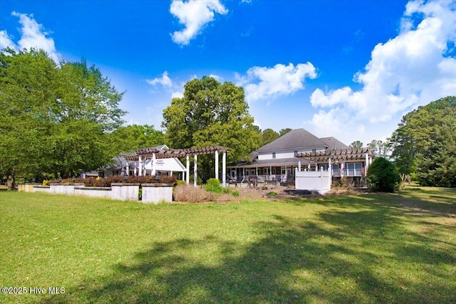 342 Shirley Plantation Dr, Snow Hill, NC 28580 - rear view of property featuring a pergola and a yard