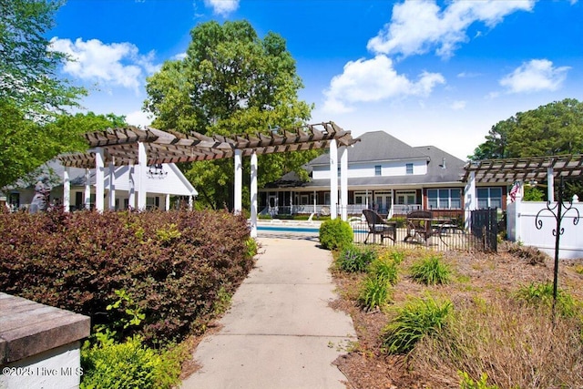 342 Shirley Plantation Dr, Snow Hill, NC 28580 - view of property's community featuring a pergola, fence, a swimming pool, and a patio area