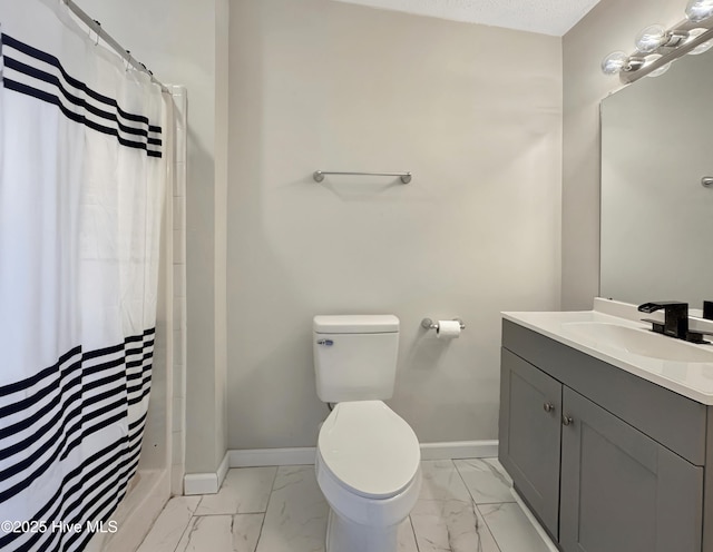 70 Little Pond Rd, Rocky Point, NC 28457 - full bathroom featuring marble finish flooring, baseboards, and toilet