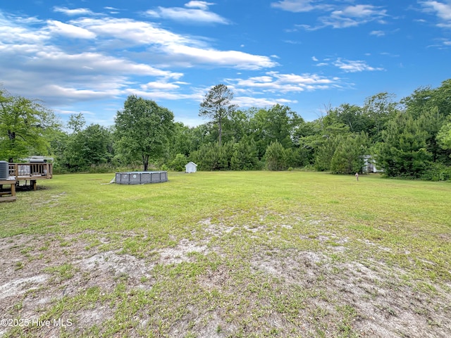 70 Little Pond Rd, Rocky Point, NC 28457 - view of green lawn featuring a covered pool