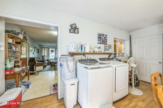 525 Edwards Rd, Jacksonville, NC 28540 - clothes washing area featuring independent washer and dryer and light wood-type flooring