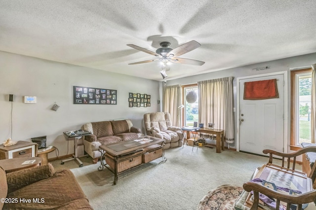 525 Edwards Rd, Jacksonville, NC 28540 - living room with ceiling fan, a textured ceiling, carpet floors, and baseboards