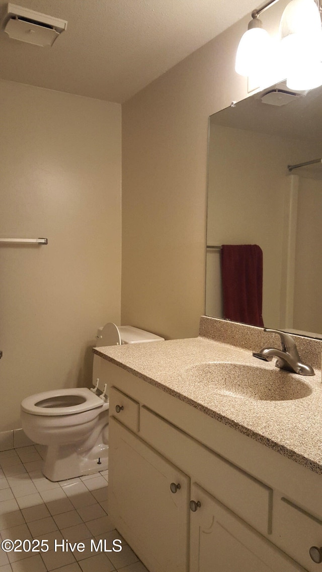 500 Umstead Dr Unit 304C, Chapel Hill, NC 27516 - bathroom with toilet, tile patterned floors, and vanity