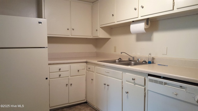 500 Umstead Dr Unit 304C, Chapel Hill, NC 27516 - kitchen with white appliances, light countertops, white cabinets, and a sink