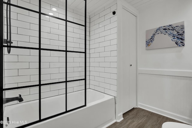1855 Newkirk Rd, Wilmington, NC 28409 - full bath with  shower combination, toilet, wood finished floors, and baseboards