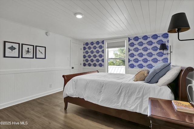 1855 Newkirk Rd, Wilmington, NC 28409 - bedroom featuring wainscoting, wood finished floors, and wood ceiling