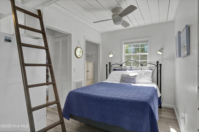 1855 Newkirk Rd, Wilmington, NC 28409 - bedroom with wood finished floors, wood ceiling, crown molding, and a ceiling fan