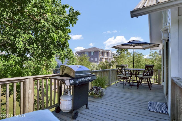 1855 Newkirk Rd, Wilmington, NC 28409 - wooden terrace featuring outdoor dining area and area for grilling