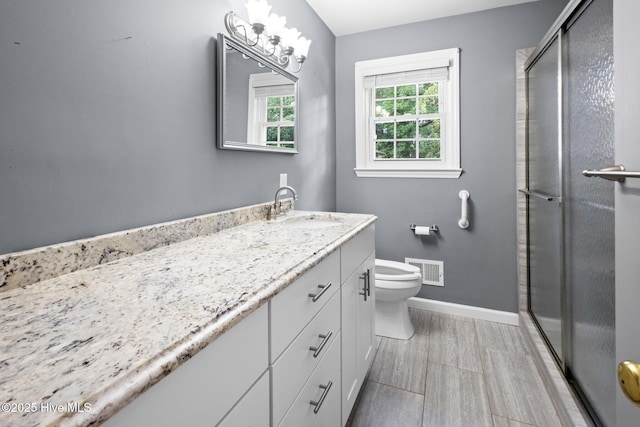 330 Breckenridge Dr, Wilmington, NC 28412 - full bath featuring vanity, toilet, a stall shower, and baseboards