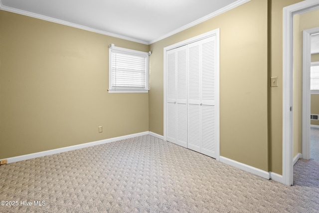 330 Breckenridge Dr, Wilmington, NC 28412 - unfurnished bedroom featuring carpet flooring, ornamental molding, a closet, and baseboards