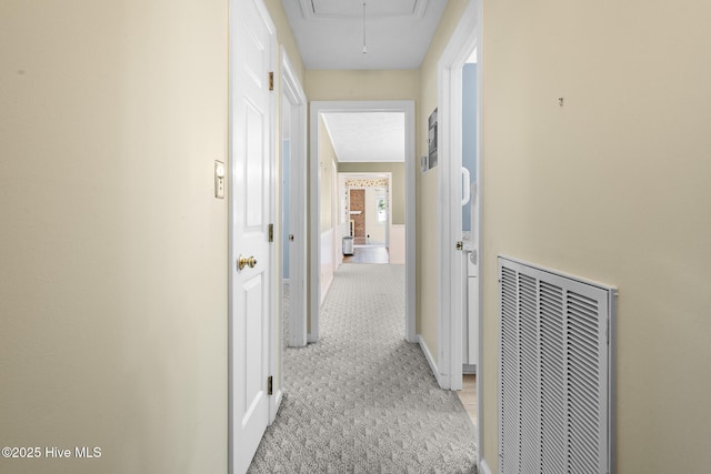 330 Breckenridge Dr, Wilmington, NC 28412 - hallway with attic access, light carpet, and baseboards
