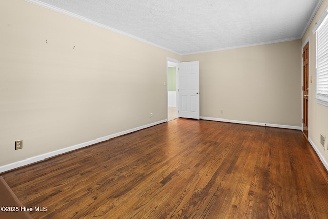 330 Breckenridge Dr, Wilmington, NC 28412 - empty room featuring dark wood-style flooring, baseboards, a textured ceiling, and ornamental molding