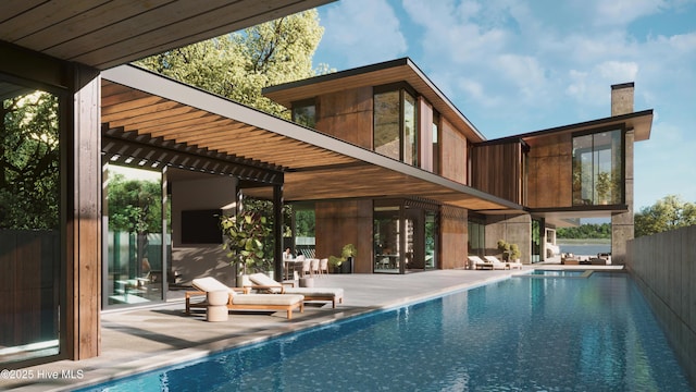 back of property with a patio and a chimney