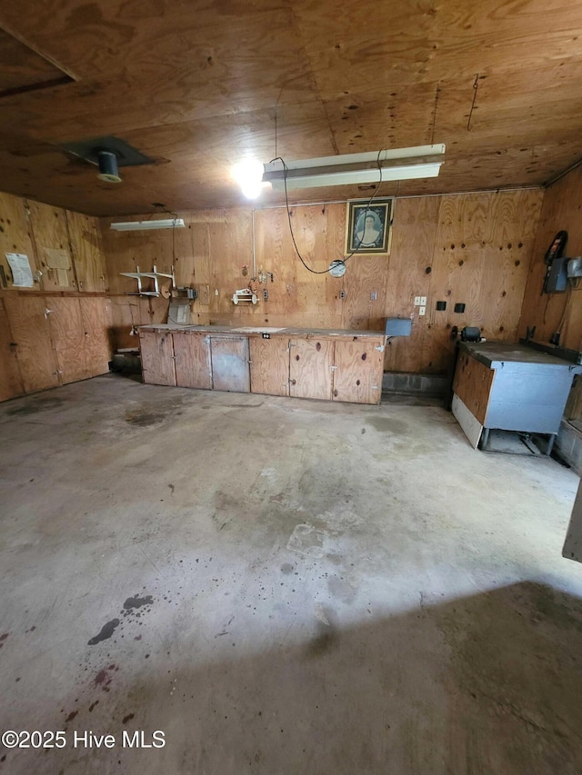 146 Gliden Rd, Hobbsville, NC 27946 - garage featuring a workshop area and wood walls