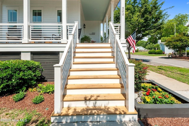 doorway to property with covered porch