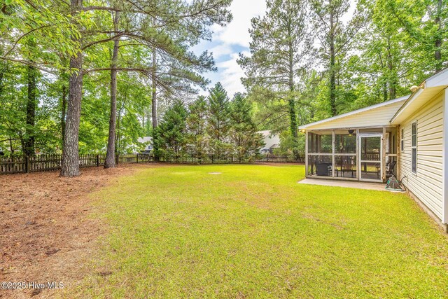 7394 Red Stone Ct, Leland, NC 28451 - view of yard featuring a sunroom
