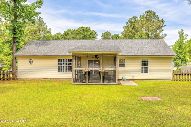 7394 Red Stone Ct, Leland, NC 28451 - rear view of house featuring a sunroom, a shingled roof, a ceiling fan, and a patio area